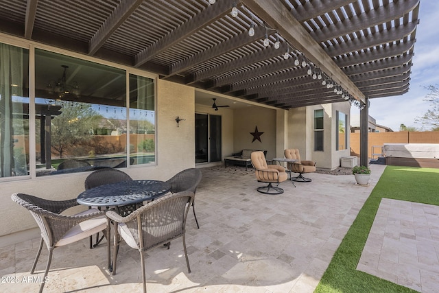 view of patio with a ceiling fan, fence, and a pergola