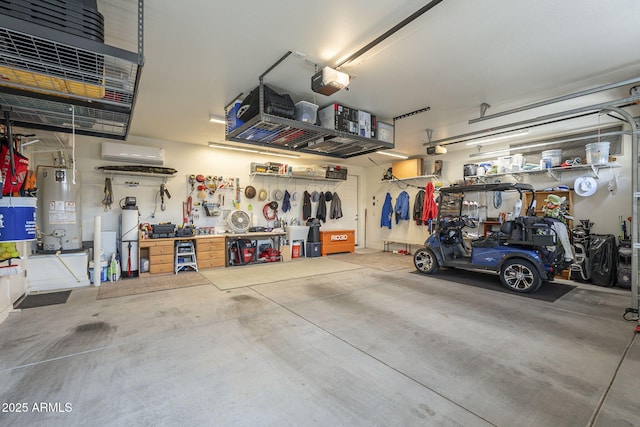 garage with a garage door opener, gas water heater, and a workshop area