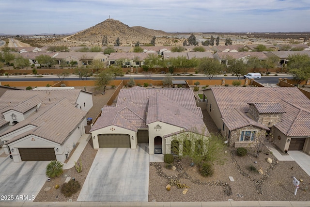 bird's eye view featuring a residential view and a mountain view