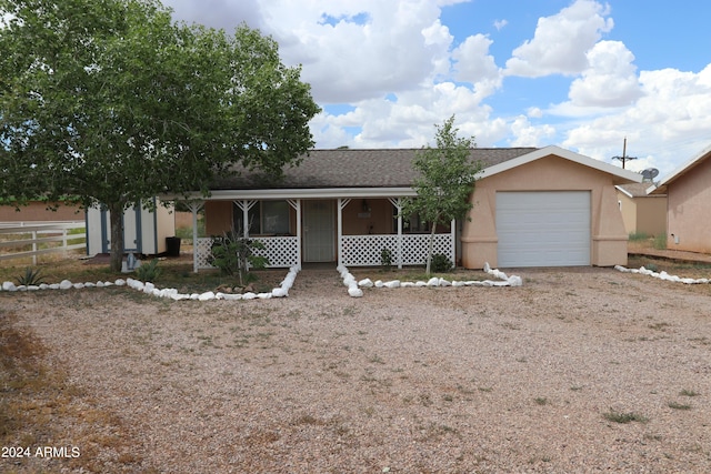 ranch-style house featuring a garage