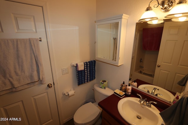 full bathroom with shower / bath combination, toilet, and vanity