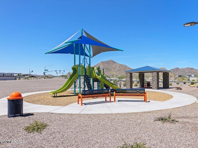 view of play area featuring a gazebo and a mountain view