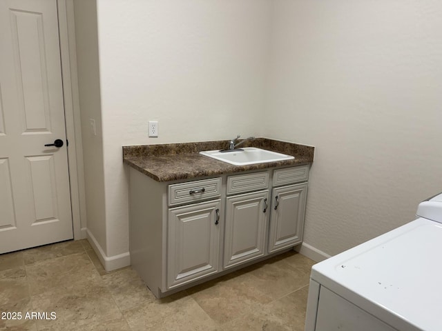 22903 N 39th Ter, Phoenix, AZ 85050 - laundry area featuring washer / clothes dryer and cabinet space