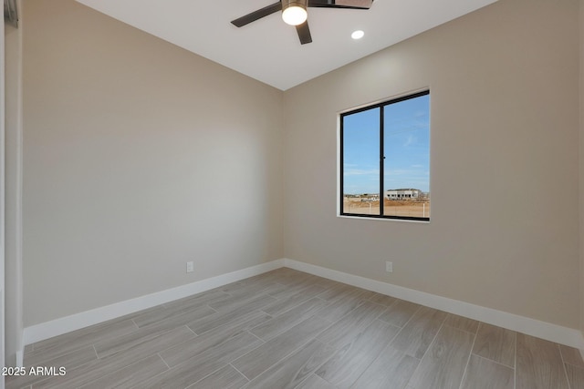 empty room featuring ceiling fan, wood finish floors, recessed lighting, and baseboards