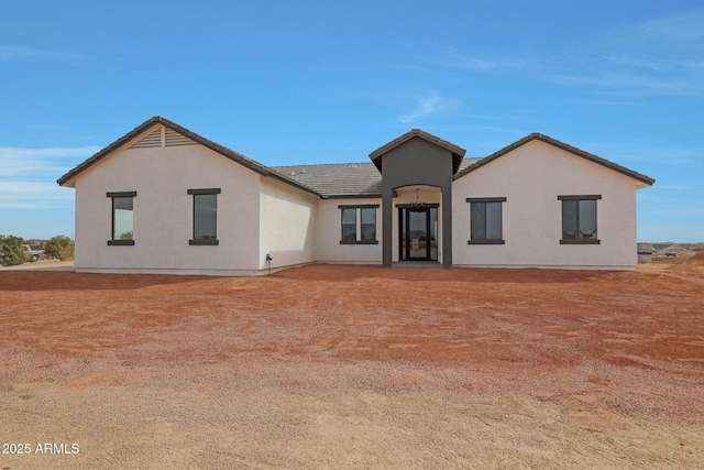 view of front of home with stucco siding