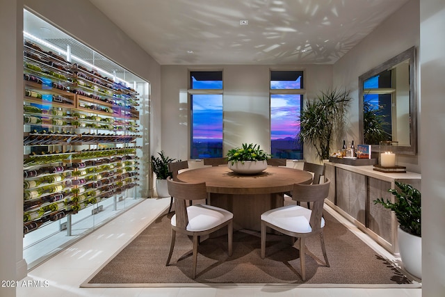 dining space with light tile floors