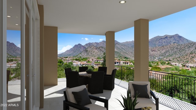 balcony featuring a mountain view