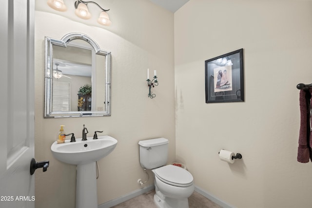2163 N 164th Dr, Goodyear, AZ 85395 - half bathroom with toilet and a sink