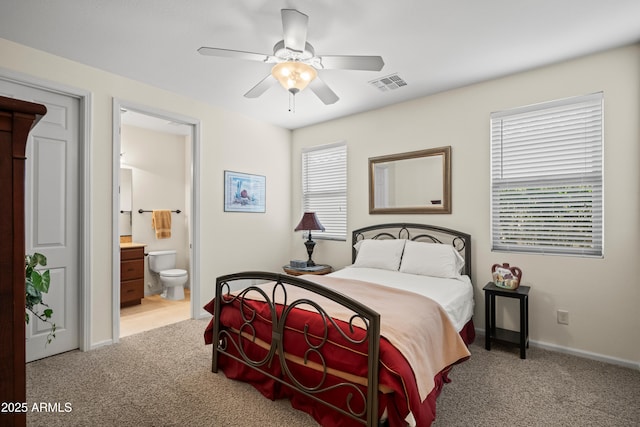 2163 N 164th Dr, Goodyear, AZ 85395 - bedroom featuring carpet, ensuite bathroom, and a ceiling fan