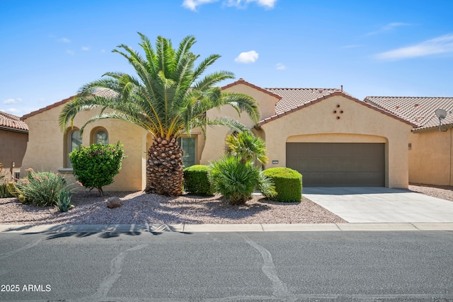 2163 N 164th Dr, Goodyear, AZ 85395 - mediterranean / spanish home featuring stucco siding, a garage, and concrete driveway