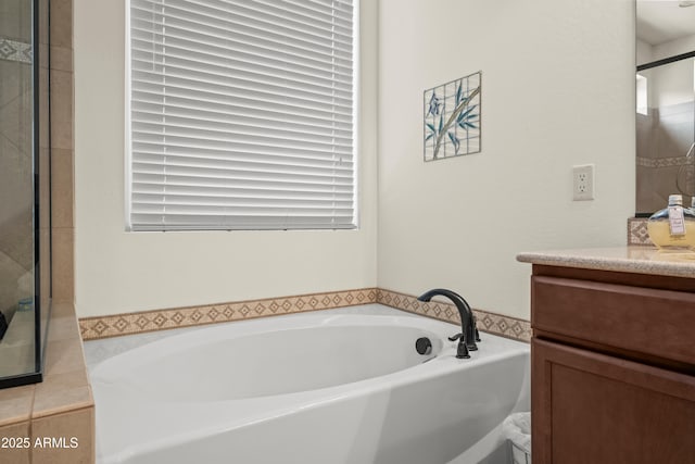 2163 N 164th Dr, Goodyear, AZ 85395 - full bathroom featuring vanity and a garden tub