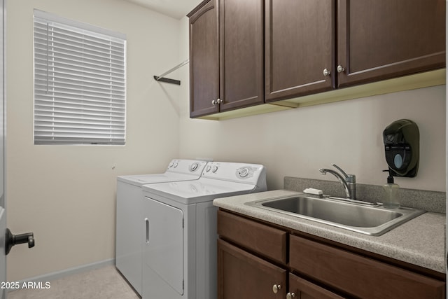 2163 N 164th Dr, Goodyear, AZ 85395 - laundry room featuring independent washer and dryer and cabinet space
