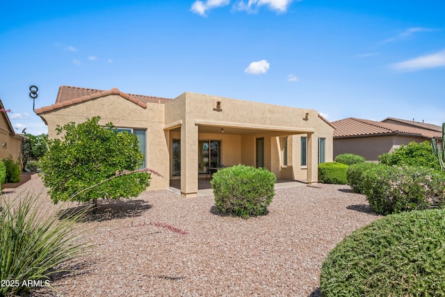 2163 N 164th Dr, Goodyear, AZ 85395 - back of property featuring stucco siding, a patio, and a tile roof