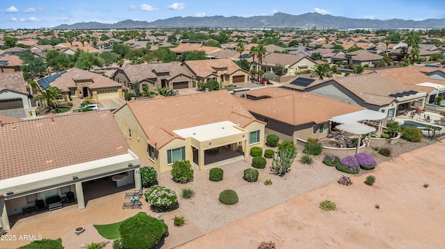 2163 N 164th Dr, Goodyear, AZ 85395 - aerial perspective of suburban area featuring mountains