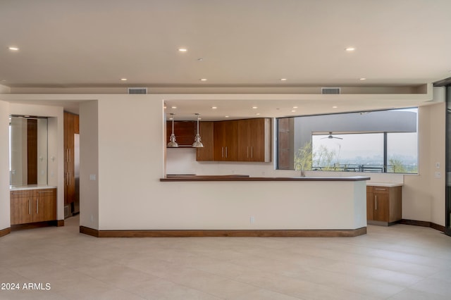 kitchen with pendant lighting and sink