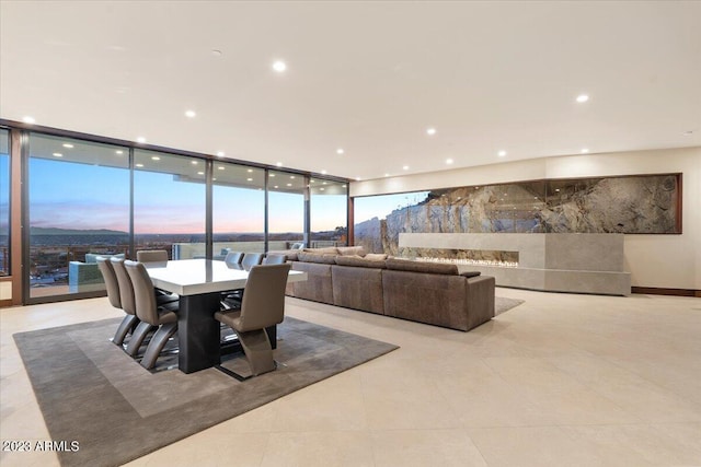 dining room with floor to ceiling windows