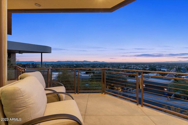 view of balcony at dusk