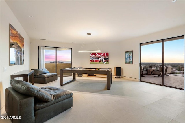 playroom featuring billiards and plenty of natural light