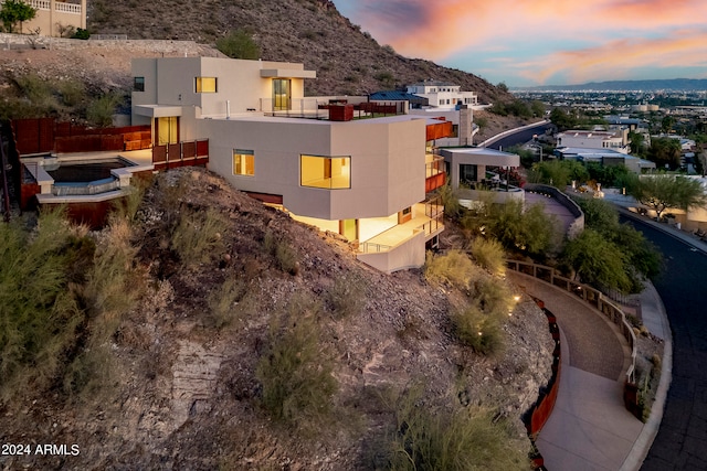 aerial view at dusk with a mountain view