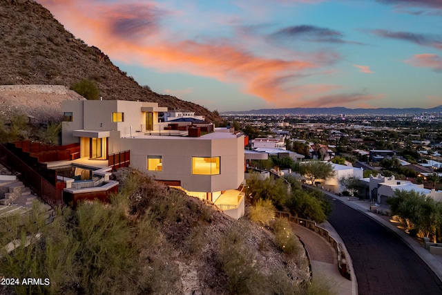 aerial view at dusk with a mountain view