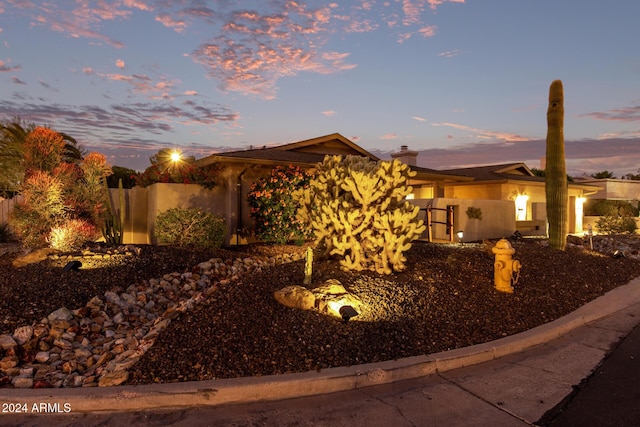 view of property exterior at dusk