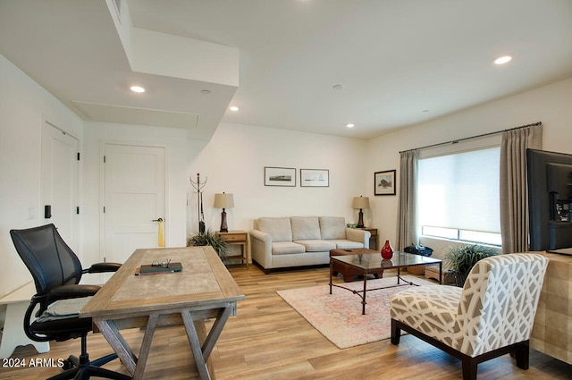 living room with light hardwood / wood-style floors