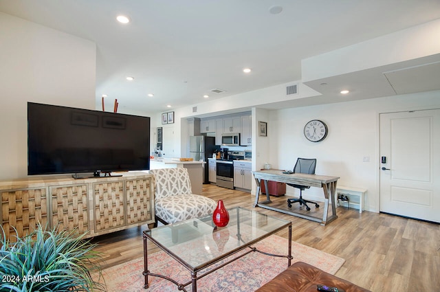 living room featuring light hardwood / wood-style floors