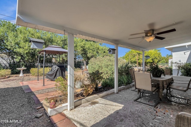 view of patio / terrace featuring ceiling fan