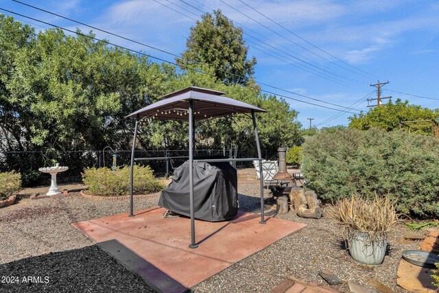 view of patio / terrace featuring a gazebo and area for grilling