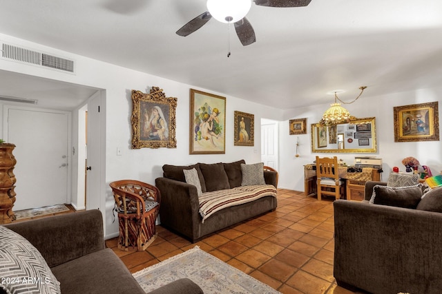 tiled living room with ceiling fan and visible vents