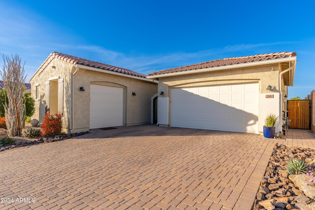 view of front of property with a garage