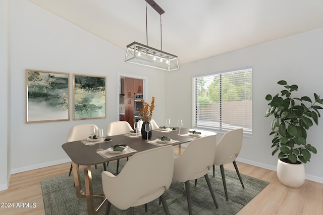 dining room with wood finished floors and baseboards