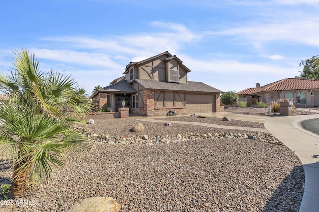4547 E Buist Ave, Phoenix, AZ 85044 - view of front of home featuring driveway, brick siding, an attached garage, and roof with shingles