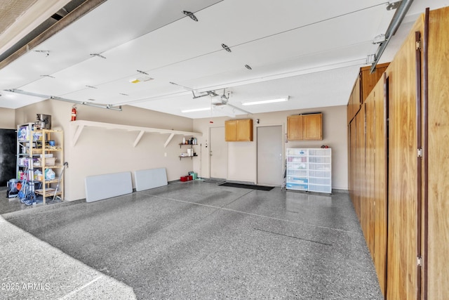 4547 E Buist Ave, Phoenix, AZ 85044 - garage featuring a garage door opener