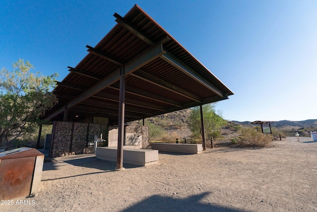 4547 E Buist Ave, Phoenix, AZ 85044 - view of parking / parking lot featuring mail area and a mountain view