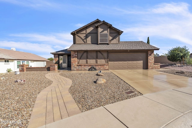 4547 E Buist Ave, Phoenix, AZ 85044 - tudor house with brick siding, concrete driveway, and stucco siding