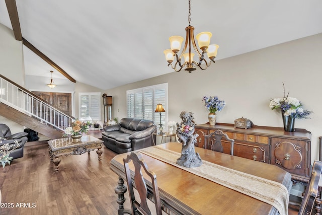 4547 E Buist Ave, Phoenix, AZ 85044 - dining room featuring stairs, a chandelier, wood finished floors, and lofted ceiling