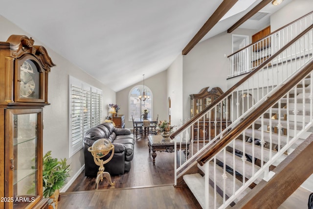 4547 E Buist Ave, Phoenix, AZ 85044 - living area with wood finished floors, lofted ceiling, stairway, and a chandelier
