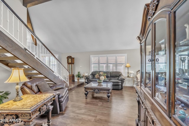 4547 E Buist Ave, Phoenix, AZ 85044 - living room featuring stairway, wood finished floors, and lofted ceiling