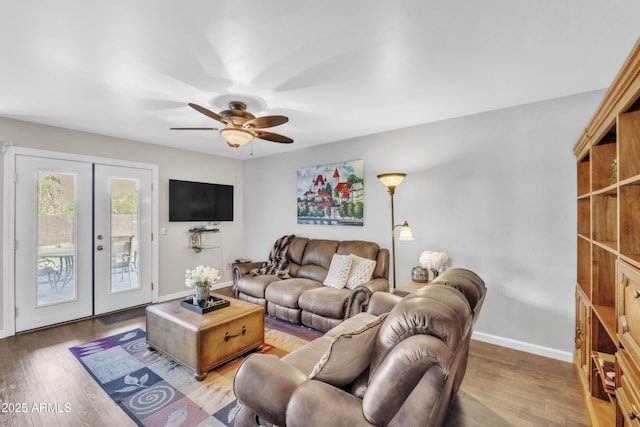 4547 E Buist Ave, Phoenix, AZ 85044 - living area featuring french doors, ceiling fan, and wood finished floors