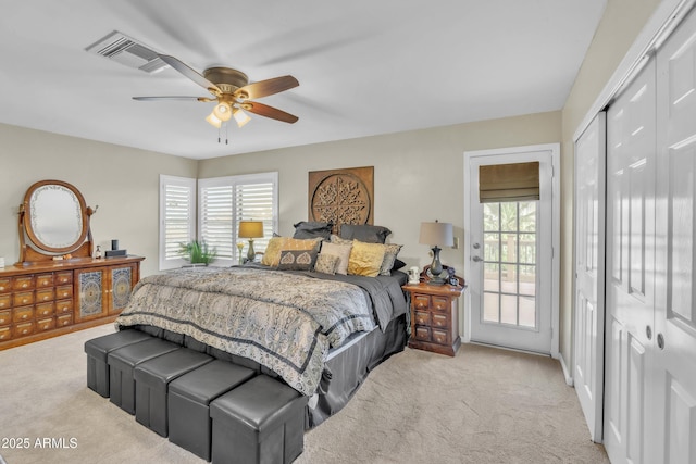 4547 E Buist Ave, Phoenix, AZ 85044 - bedroom with light colored carpet, a closet, and a ceiling fan