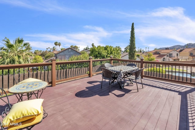 4547 E Buist Ave, Phoenix, AZ 85044 - deck featuring outdoor dining space and a residential view