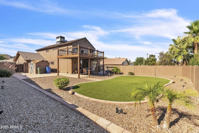 4547 E Buist Ave, Phoenix, AZ 85044 - rear view of house featuring a fenced backyard, a patio area, and a deck