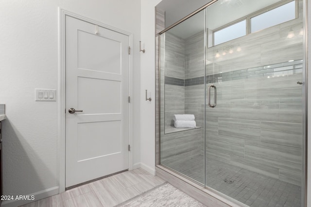 bathroom featuring vanity and walk in shower