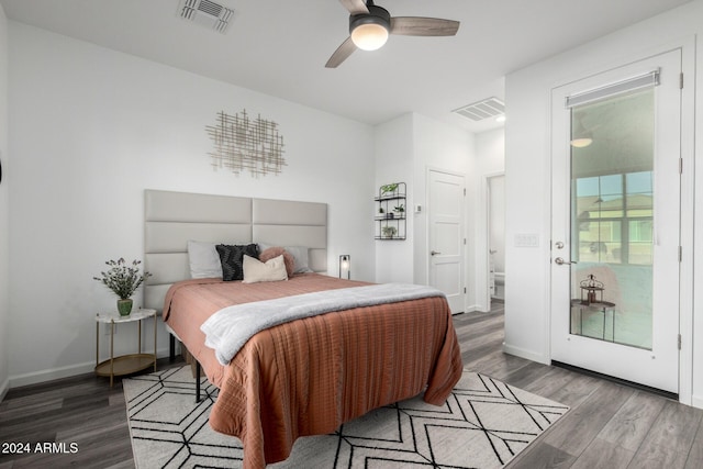 bedroom with access to outside, hardwood / wood-style flooring, and ceiling fan