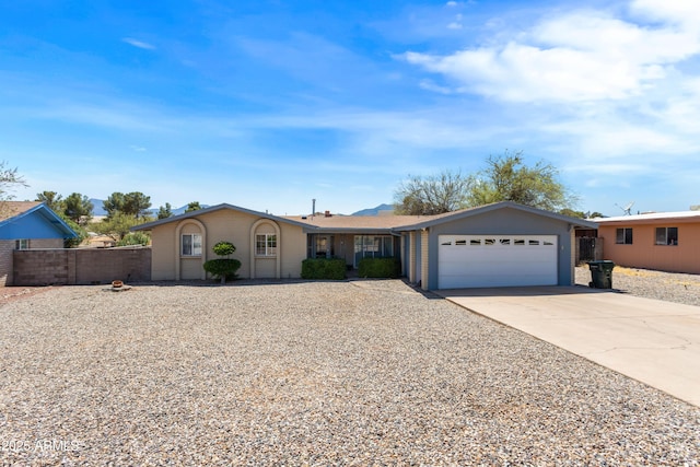 2232 Carmelita Dr, Sierra Vista, AZ 85635 - single story home with an attached garage, concrete driveway, and fence