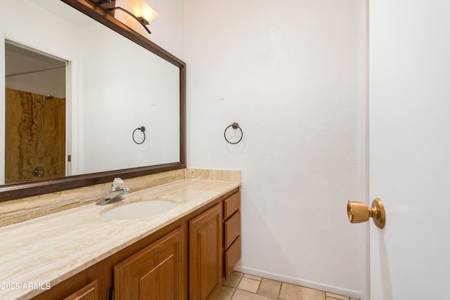 2232 Carmelita Dr, Sierra Vista, AZ 85635 - bathroom featuring tile patterned flooring, vanity, and baseboards