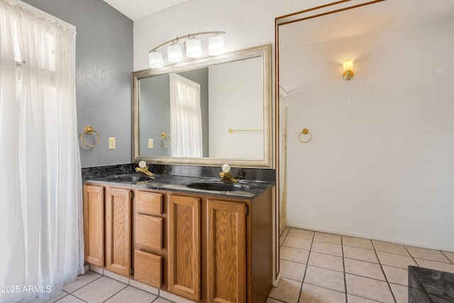 2232 Carmelita Dr, Sierra Vista, AZ 85635 - bathroom with double vanity, a sink, and tile patterned flooring
