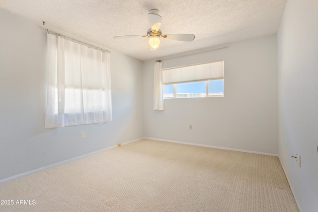 2232 Carmelita Dr, Sierra Vista, AZ 85635 - empty room with baseboards, a textured ceiling, a ceiling fan, and carpet floors