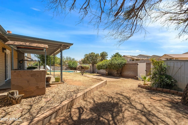 2232 Carmelita Dr, Sierra Vista, AZ 85635 - view of yard featuring a fenced backyard and a fenced in pool